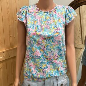 Stella parker t shirt with pom pom embellishments . In excellent condition!